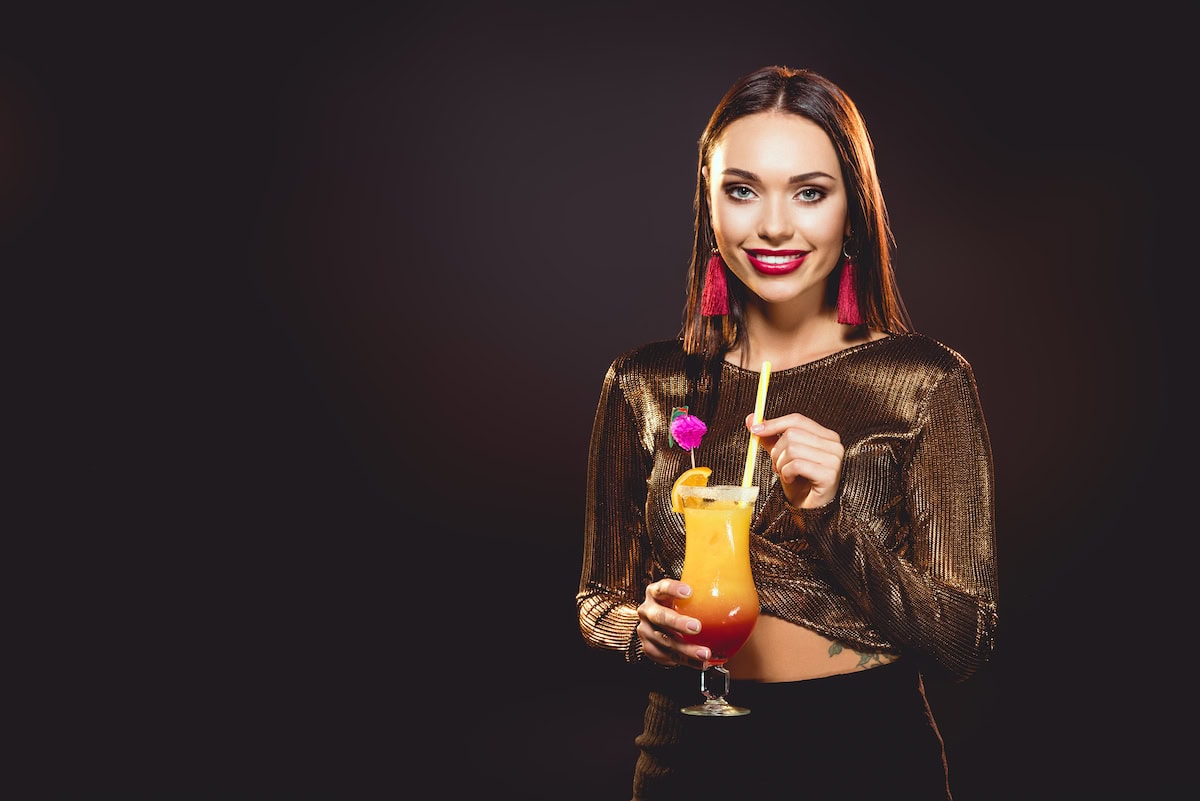 brunette glamorous smiling girl with alcohol cockt 2024 11 18 10 14 04 utc