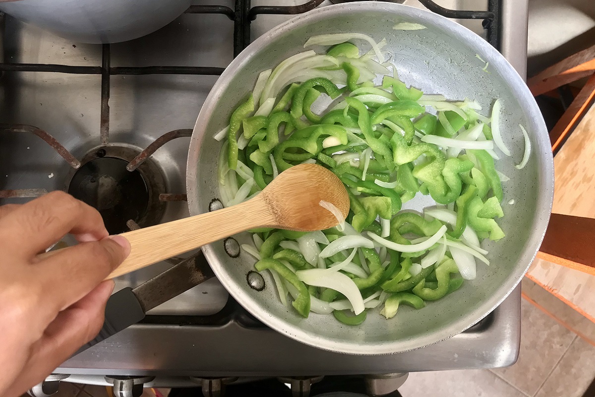 Cooking with Less Oil Just Got Easier with These 13 Tricks closeup shot of chopped onions and green peppers i 2025 02 11 21 07 14 utc