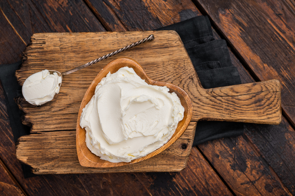 traditional mascarpone cheese in wooden bowl wood 2025 01 16 02 16 55 utc