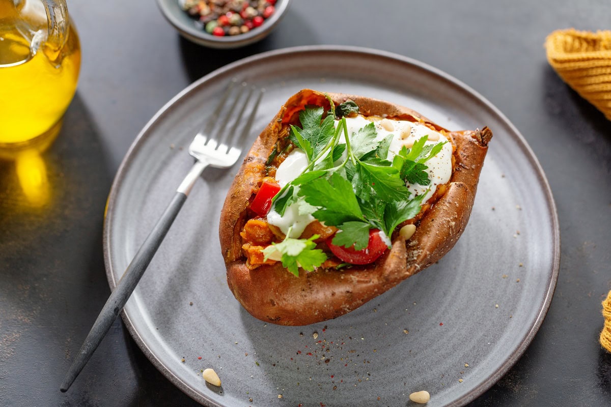 13 Dinner Recipes That Make Leftovers Taste Better Than Day One baked sweet potato with sour cream 2024 10 22 23 20 06 utc