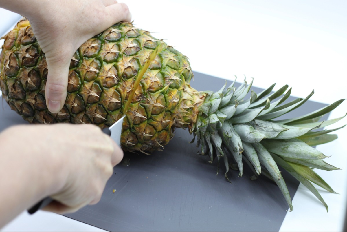 How To Cut A Pineapple Without Making A Mess how to cut a pineapple